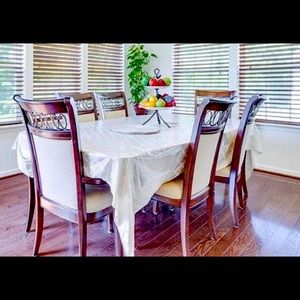 Hard wood Dining table + 6 Chairs+ an extra leaf